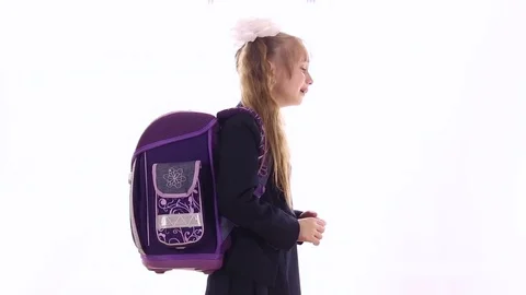 Schoolgirl with a huge backpack is crying Stock Footage 72916757