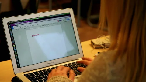 Schoolgirl in school using a laptop for studying Stock Footage 45161127