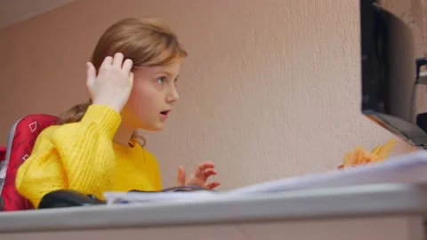 Schoolgirl Studying At The Computer Stock Footage 168884598