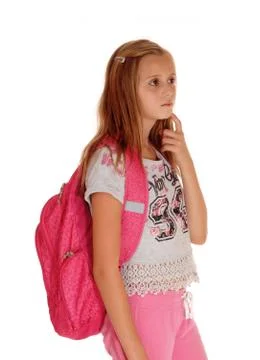 Schoolgirl thinking with backpack. Stock Photos