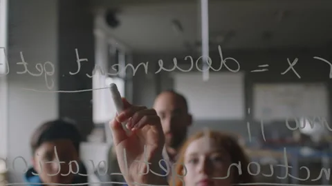 Schoolgirl Writing Coding Function on Glass during Programming Lesson Stock Footage 278129874