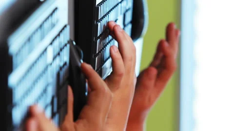 Schoolgirls using computer in classroom Stock Footage 301361416