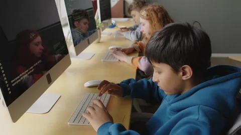 Schoolkids Writing Programming Code on Desktop Computers in Class Stock Footage 278128259