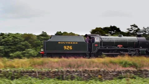 Schools class steam engine 926 'Repton' on North York Moors Railway Stock Footage 150878323