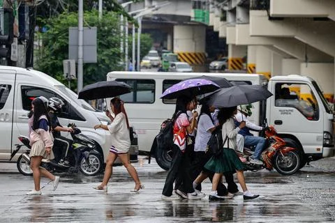 Schools suspend classes in Metro Manila due to heavy rainfall forecast, Quezon C Photos