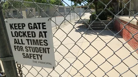 Schoolyard closed gate 4 Video stock 130833607