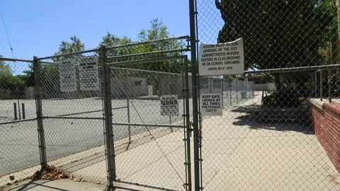 Schoolyard closed gate Video stock 130833669