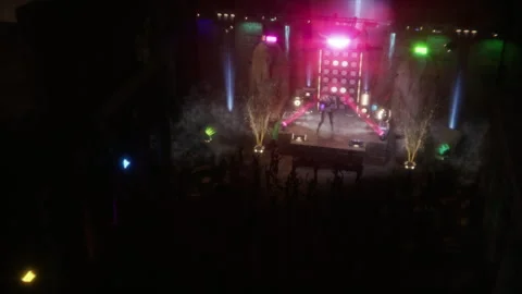 Sci-fi queen mummy captivates in a vibrant rock show Stock Footage 294428030