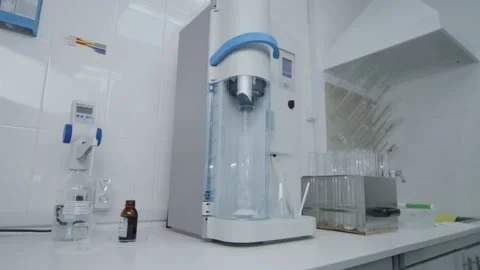Science and Technology. Water Testing In Machine At Laboratory. Stock Footage 173177610