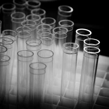 Science background loading solutions tubes Stock Photos