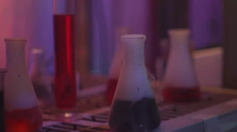 Science Beakers Bubble In The Mad Science Lab Stock Footage 33850058