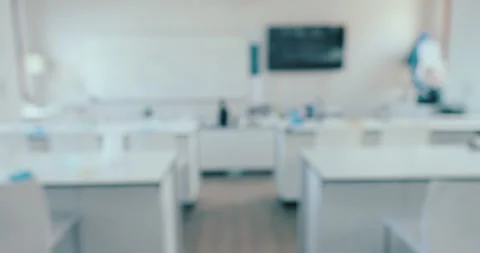 Science, classroom and blur with empty room of laboratory for learning Stock Footage 249667362