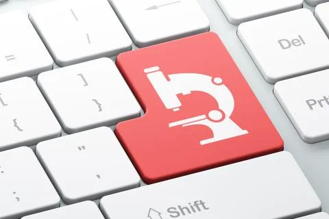 Science concept: Microscope on computer keyboard background イラスト素材