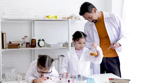 Science education in laboratory lab with elementary diversity students in c.. Stock Footage 243553516