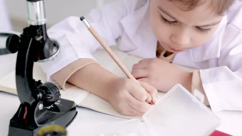 Science education in laboratory lab with elementary Caucasian students in c.. Stock Footage 243658785