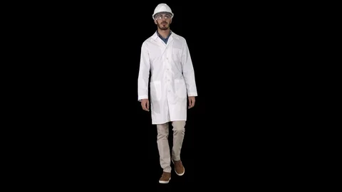 Science engineer walking in safety helmet and glasses, Alpha Channel Stockbeeldmateriaal 109059067