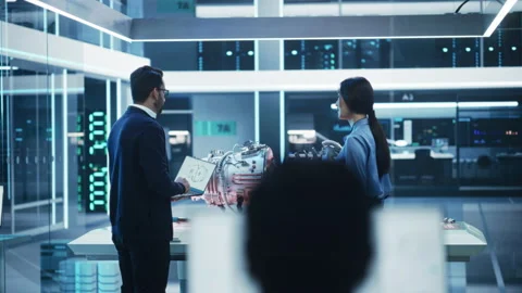 Science Engineers Enter Turbine Engine Development Facility Stock Footage 229839978