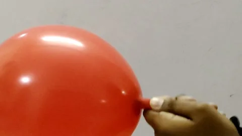 Science experiment - Science experiment with Orange with balloon- 4k video Stock Footage 220353761