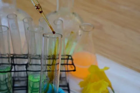 Science experiment on transparent test tubes and chemical substance Stock Photos
