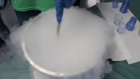 Science fair. Making ice cream with liquid nitrogen. Stock Footage 132724233