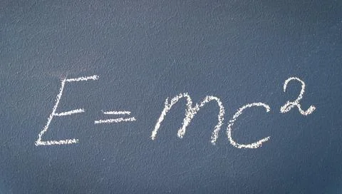 Science formula on the blackboard. The study of physics. Hand draws with chalk Stock Photos