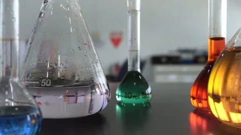 Science Glassware in a research quality control in Chemical Laboratory Stock Footage 112525673
