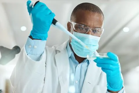 Science, lab and man with sample in petri dish for research, medical study .. Stock Photos