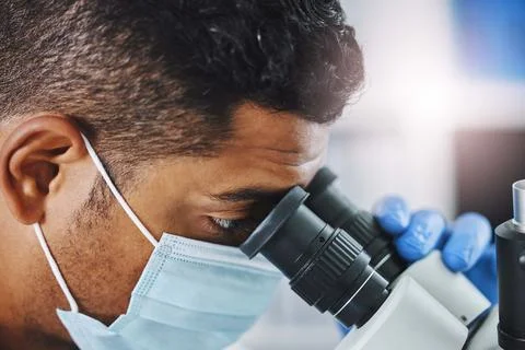 Science, laboratory and man with microscope for research, medical analysis and Foto stock