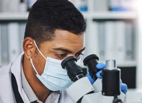 Science, laboratory and man with microscope for research, medical analysis and Foto stock