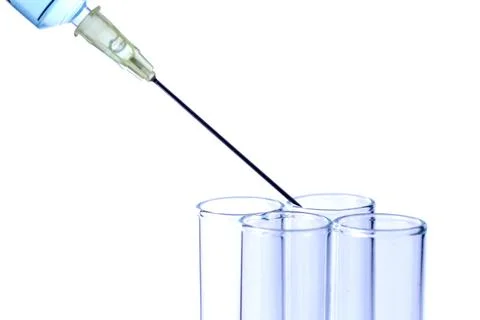Science laboratory test tubes with syringes on white background Stock-Fotos
