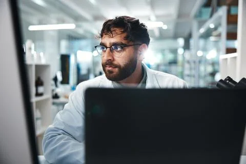 Science, man and thinking in laboratory on computer for medical results Stock Photos