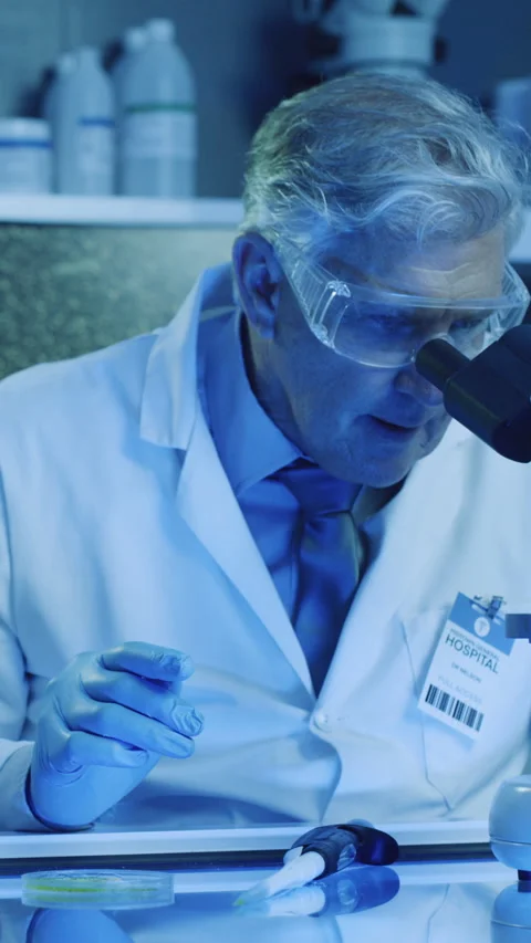 Science, notes or team in lab with microscope, analysis or examination for Stock Footage 335838628