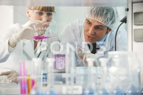 Science people in bright lab Stock Photos