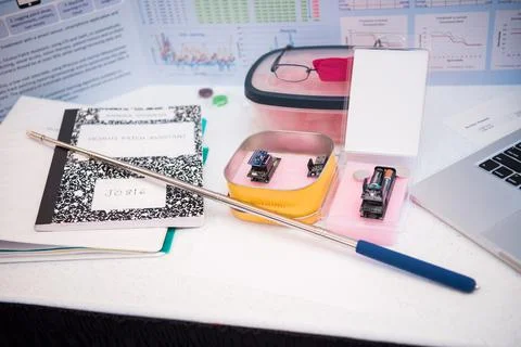 Science project exhibition for students with notepad and pointer Foto stock