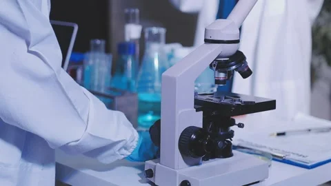 Science, research and hands in lab with notebook and computer on scientific.. Stock Footage 344457365