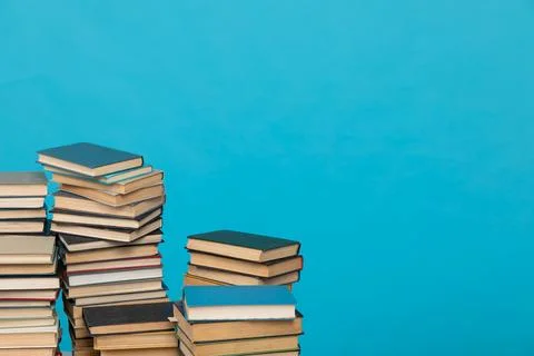 Science stack of books in the library on a blue background training education Stock Photos