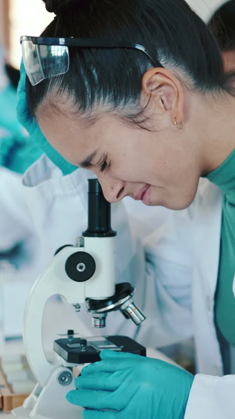 Science, student and girl with microscope for education, virus analysis and Stock Footage 332907491