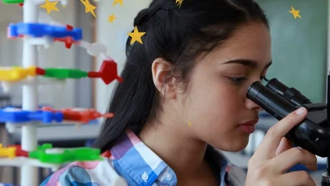 Science student turning after star glitching, peering into microscope, focusing 库存影片 335235271
