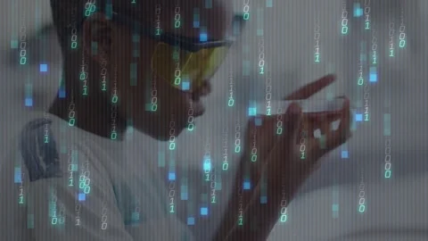 Science student wearing goggles rotating petri dish initiating binary code Stock Footage 327591936