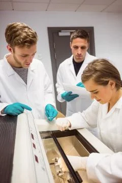 Science students using incubator in the lab 스톡 사진