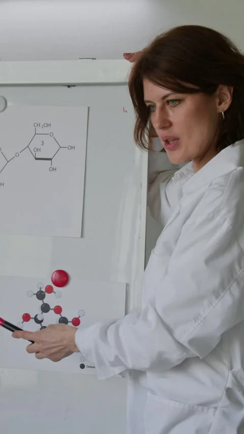 Science Teacher Delivering Lecture During Chemistry Class in Lab Stock Footage 312318828