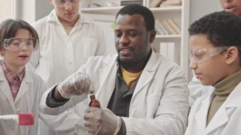 Science Teacher Showing Lab Experiment Stock Video Pond5