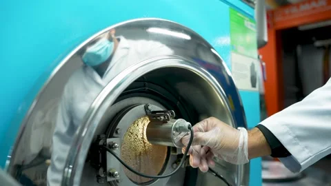 Science Technician Inspecting An Industrial Machine With A Light During Testing 스톡 동영상 334190101