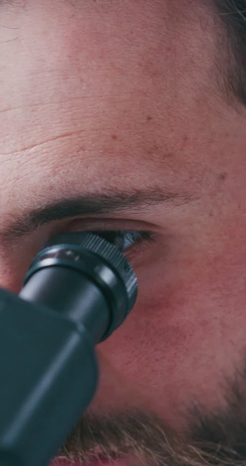 Science, test or man in lab with microscope, analysis or examination in vaccine Stock Footage 331578072