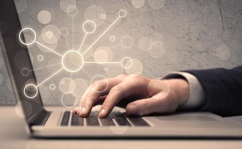Science worker typing on laptop computer Stock Photos