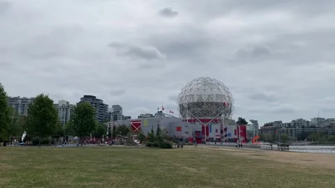 Science world with anonymous people on cloudy day Stock Footage 281703870