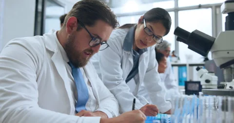 Science, writing and team with people in lab for medical, research and chemistry Stock Footage 319002452