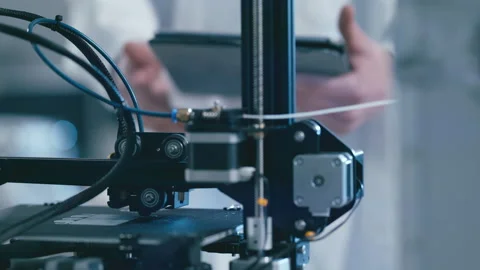 Scientific Assistant working with 3D printer in technical laboratory Stock Footage 149248782