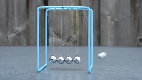 Scientific experiment with a self made device. Collision balls in action. Stock Footage 115527403