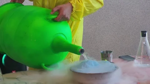 Scientific experiments with liquid nitrogen in the laboratory Stock Footage 243723192